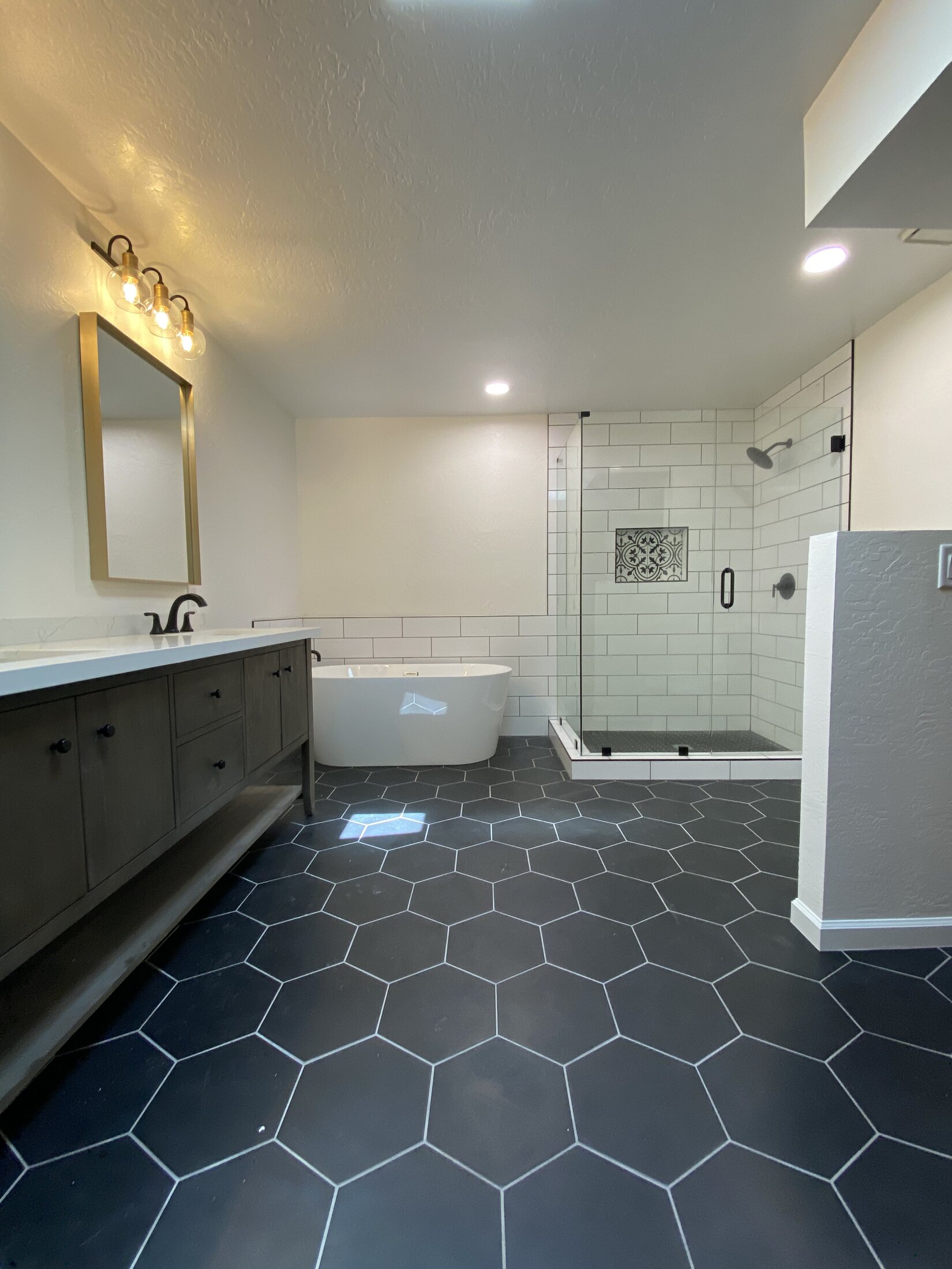 Master bathroom remodel with hexagon tile floor and freestanding tub, West Valley AZ