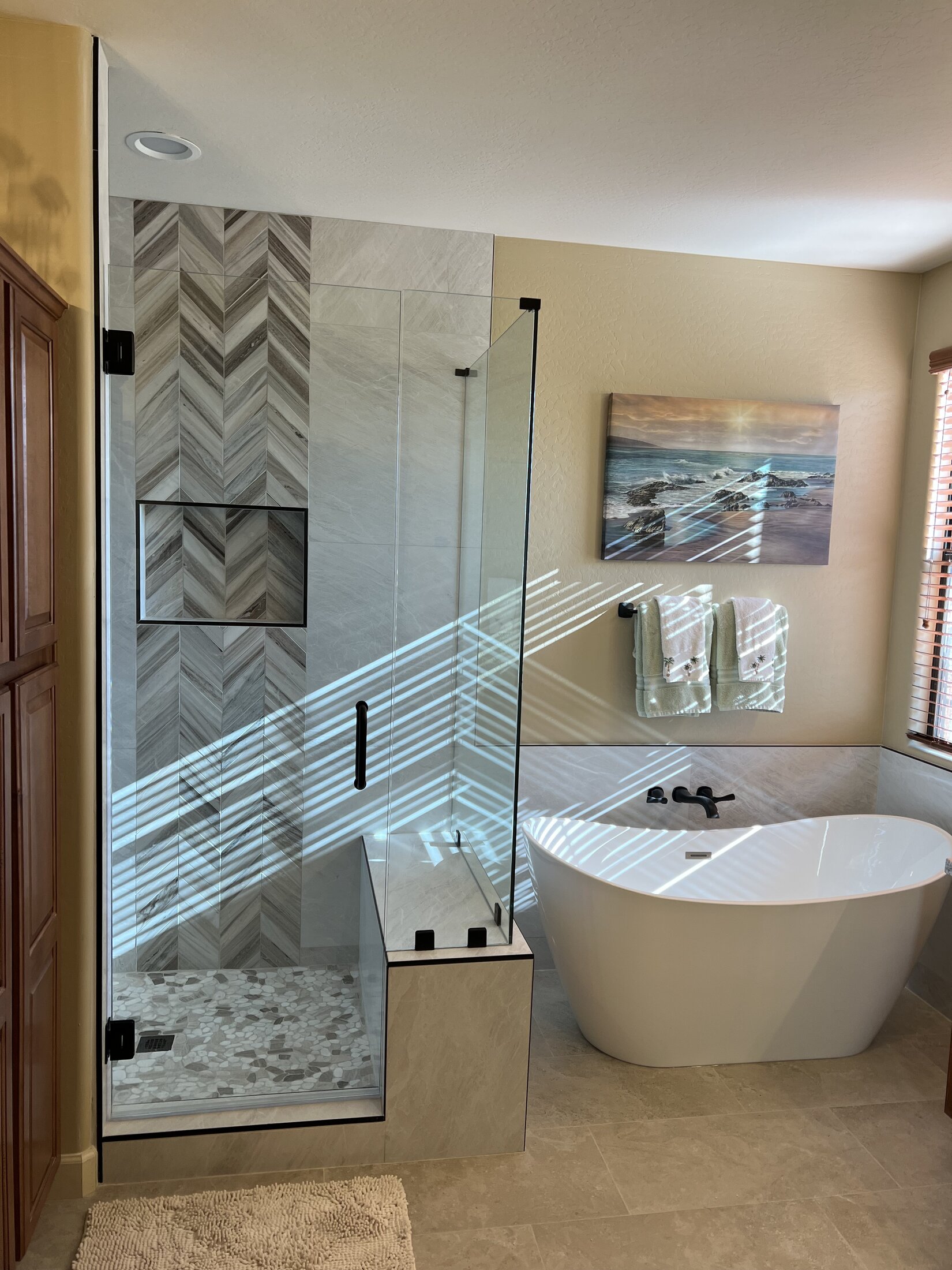 Chevron tile master bath with freestanding soaking tub, JBS remodel